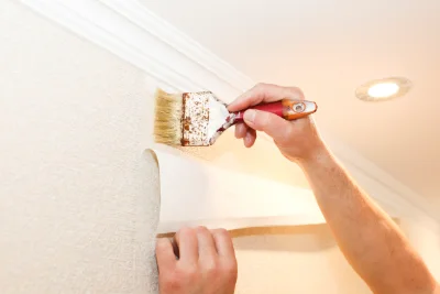 Pose de papier peint à Botsorhel — revêtements muraux et toiles de verre